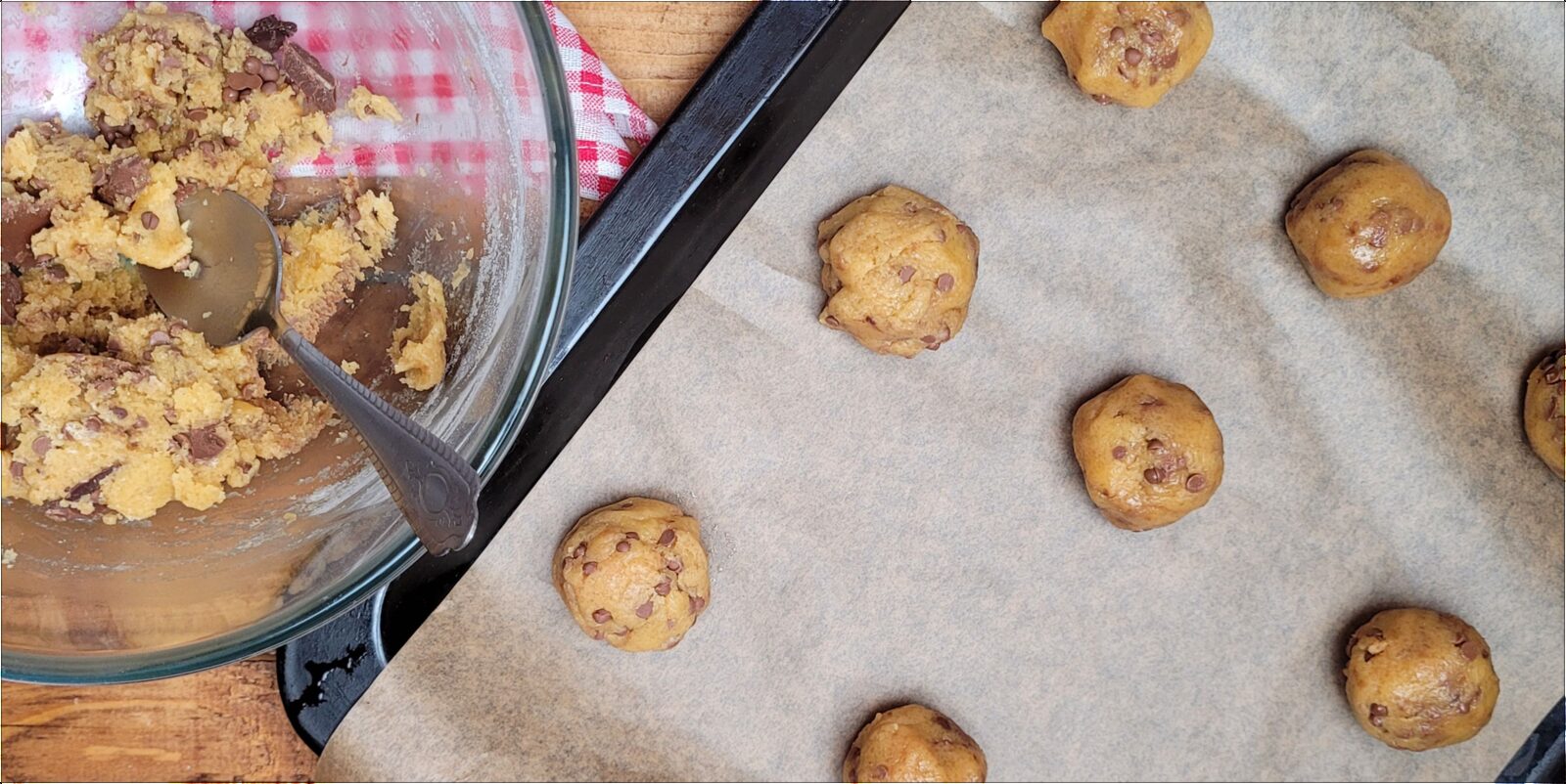 Formed cookie dough on a parchment-lined baking sheet beside the mixing bowl